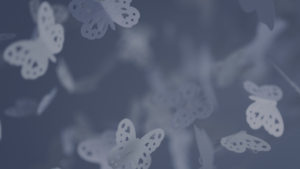 Photography of cut-out butterfly decorations with navy blue colour overlay.